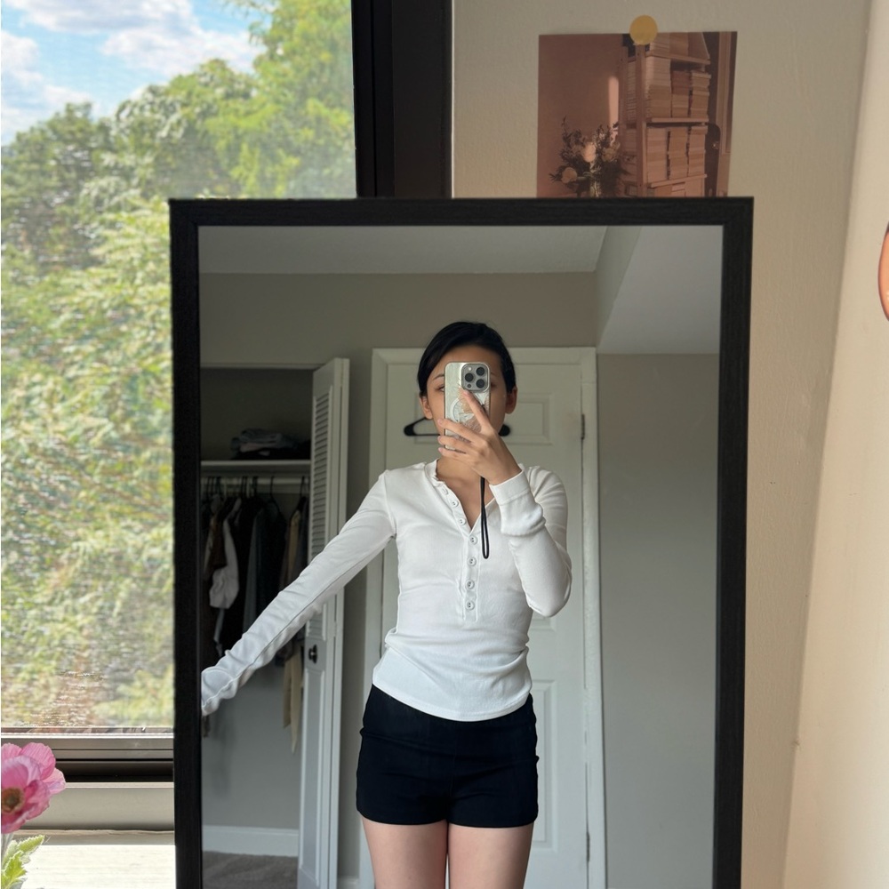 White Long Sleeve Top and Black Shorts